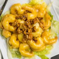 Honey Walnut Shrimp · Crispy shrimp over lettuce glazed with honey walnut sauce topped with walnut.