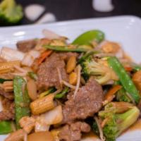 Beef Chop Suey · Tender sliced beef with nape cabbage broccoli zucchini carrots mushroom water chestnuts baby...