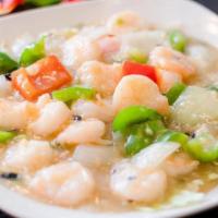 Shrimp In Lobster Sauce · Shrimp stir fried with green pepper onion & carrot in a light creamy sauce.
