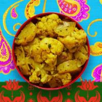 Aloo Gobhi · Cauliflower and potatoes cooked with herbs and spices.