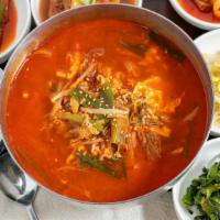 Yuk Gae Jang · Hot and spicy shredded beef soup special with variety of side dishes and rice.