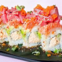 Marilyn Mon-Roll · [in] spicy crab, cucumber
[out] albacore, avocado, spicy tuna, chunk tuna mixed
w/ masago, s...