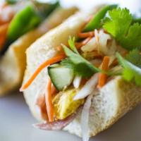 Banh Mi Breakfast · Vietnamese ham, eggs, pork pate, cucumber, housemade pickled daikon, and carrots, jalapeño, ...