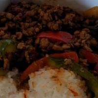 Spicy Basil Chicken · Ground chicken stir fried with red and green bell peppers, onions, and basil.