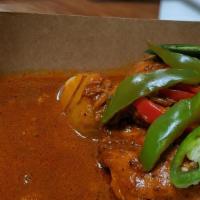 Massaman Chicken Curry · Massaman curry made from scratch with coconut milk, dark meat chicken, potatoes and red and ...