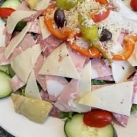 Antipasto Salad · A blend of garden greens topped with Genoa salami, mortadella, capicola, and provolone cheese.