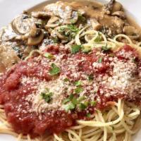 Chicken Marsala With Spaghetti · Tender cutlets of chicken sautéed with mushrooms, onions, and marsala served with spaghetti.