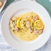 Veal Picatta · Sauteed in white wine with lemon, garlic, butter, and capers served with risotto
