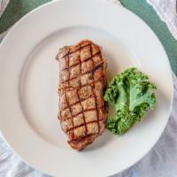 New York Strip Steak · 12 oz. Angus cut char-grilled.