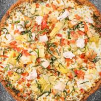 Keto Pesto Pizza · Mozzarella cheese, delicious housemade Pesto sauce, artichokes, diced tomatoes, and fresh ba...