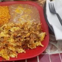 Machaca And Eggs Breakfast Plater · Beef, bell peppers, onions, tomatoes, and eggs.
