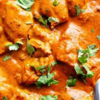 Chicken Tikka Masala · Boneless chicken breast grilled in the tandoor and slow cooked in a creamy tomato sauce.