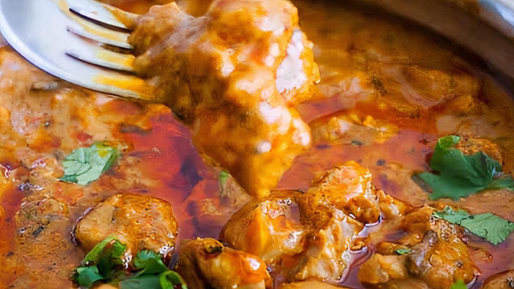 Chicken Curry · A typical curry from the Indian subcontinent consists of chicken stewed in an onion- and tomato-based sauce, flavoured with ginger, garlic, tomato puree, chilli peppers and a variety of spices, often including turmeric, cumin, coriander, cinnamon, and cardamom.