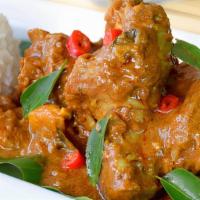 Andhra Chicken Curry · This spicy and hot simple andhra bone chicken curry called as kodi kura is a gravy that is c...