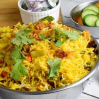 Veg Biryani · Long-grained rice (basmati) flavored  cooked with fragrant saffron, Aroma spices, fresh mint...