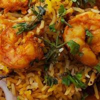 Shrimp Biryani · Long-grained rice (basmati) flavored  cooked with fragrant saffron, Aroma spices, fresh mint...