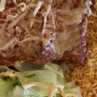 Chicken Enchiladas · Three enchiladas, chicken, cheese and house-made sauce.
