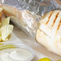 *Shawfel · Grilled chicken breast and chopped falafel wrapped in a warm pita bread with cucumbers, toma...
