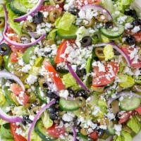 *Greek Salad · Kalamata olives, tomatoes, cucumbers, red onions, cubed feta cheese, romaine lettuce, served...