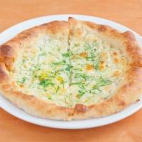Aglio Olio Pizza · Chopped Garlic, Mozzarella, Fontina, topped with Chopped Parsley.