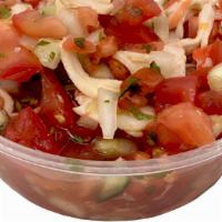 Ceviche · Imitation crab, tomatoes, onion, garlic, cilantro, black pepper, and salt.