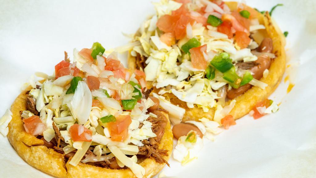 Sopes · 1 Sope Beans Choice of meat, cheese, pico de gallo and sour cream.