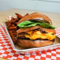 Beyond Double Cheeseburger · Two plant based beyond burger patties, American cheese, 1000 island, raw onion, tomato and l...