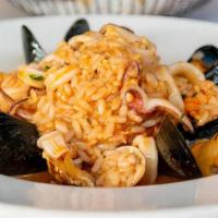 Risotto Pescatora · Risotto with mixed seafood.