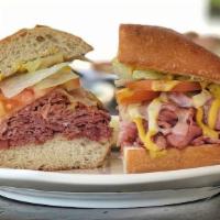 Pastrami Sandwich (Medium) · A classic pastrami sandwich with lettuce, tomatoes, mustard and Swiss cheese.