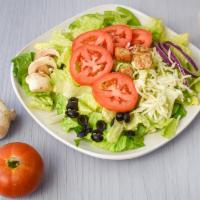 Mixed Green Salad · Romaine lettuce, bell peppers, onions, tomatoes, mushrooms, olives, and mozzarella cheese.