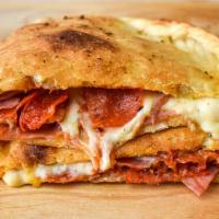 Calzone · Pocket filled with marinara sauce, mozzarella cheese, and ricotta cheese, plus your choice o...