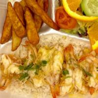Camarones Al Mojo De Ajo · butterflied shrimp with our famous garlic butter
