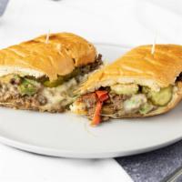 Philly Cheesesteak  · French roll, steak, mushroom, bell pepper, onion & provolone cheese