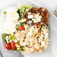 Cobb Chicken Salad  · romaine lettuce, chicken breast , eggs, diced tomatoes, red onions, fresh basil, blue cheese...