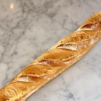 Baguette Tradition (Best Baguette Award) · Traditional baguette bread, hand-rolled, and with pointed ends. Handrolled and floured on th...