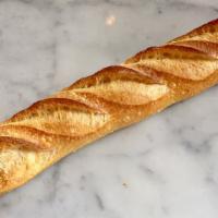 Baguette · Traditional baguette bread, with round ends. Excellent to pair any sweet or savory item or f...
