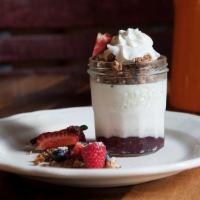 Le Parfait Yogurt · Homemade granola and yogurt and red berry jam.