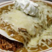 Burrito Supreme · Large flour tortilla stuffed with choice of meat, rice and beans, topped with red or green s...