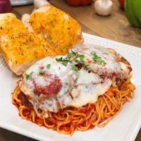 Chicken Parmigiana With Spaghetti · Served with a side of focaccia bread. Breaded chicken breast fried with marinara sauce and o...
