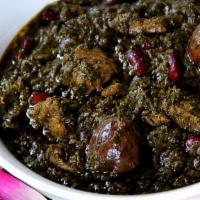 Ghormeh Sabzi · Minced parsley, cilantro, chives, fenugreek, red kidney beans, and chunks of beef cubes. Ser...