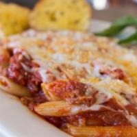 Pasta Al Forno · Baked penne served with our homemade meat sauce topped with melted mozzarella.