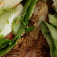 Torta · With cheese, beans, guacamole, lettuce, jalapeno, and mayo.
choice of ham, chicken, carne as...