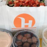 Vegetarian Family Package · 2 large hummus, 2 babghanouj, 2 tsaziki, 12 pcs grape leaves, 10 falafels, large catering st...