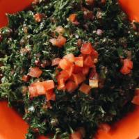 Tabbouleh (Salad) · Finely chopped parsley, tomato, onion & wheat bulgur. Mixed with lemon juice & olive oil.