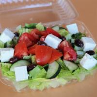 Greek Salad · Romaine lettuce, tomato, cucumber, feta cheese & black olives.