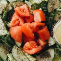 Lebanese Salad · Romaine lettuce, cucumber, tomato, & dried mint. Mixed in lemon juice, garlic & olive oil.