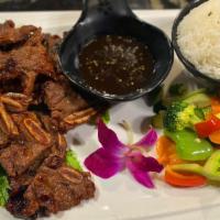 Kal Bi · Grilled Korean BBQ Short Ribs in Special House Sauce.