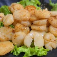 Scallop · Cooked and seasoned mollusk