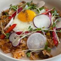 Kimchi Fried Rice · House marinated beef short rib, organic jasmine rice, sweet pickled radish, sunny side up egg