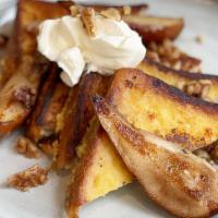 Pain Perdu · Eggspresso special oven baked French toast, Chantilly cream, roasted pear, candied walnut
